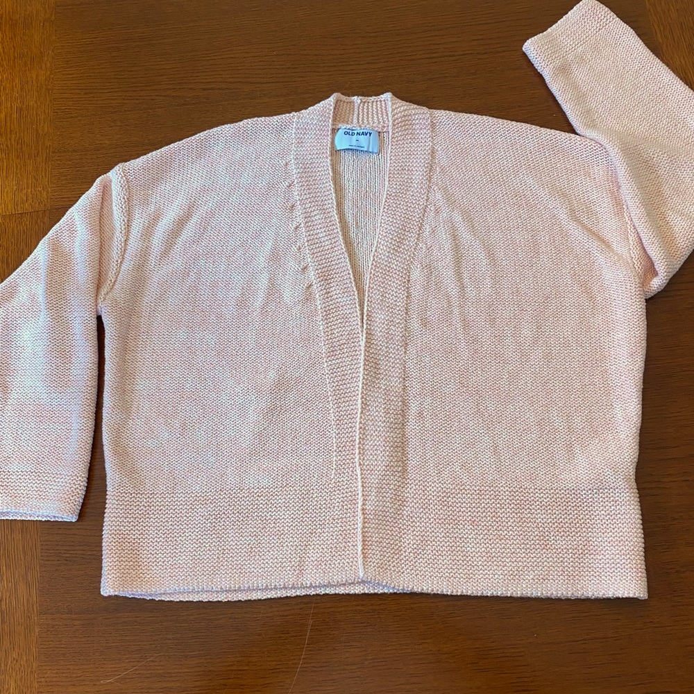 Old Navy cardigan. Size medium. Never worn. It’s a very pale peach color.